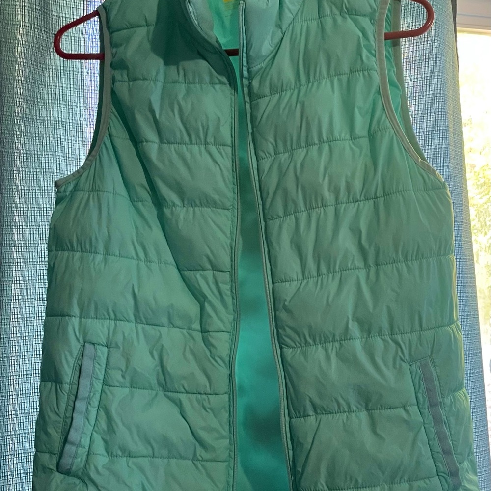 Small teal-ish vest, only wore it about 2 times.
